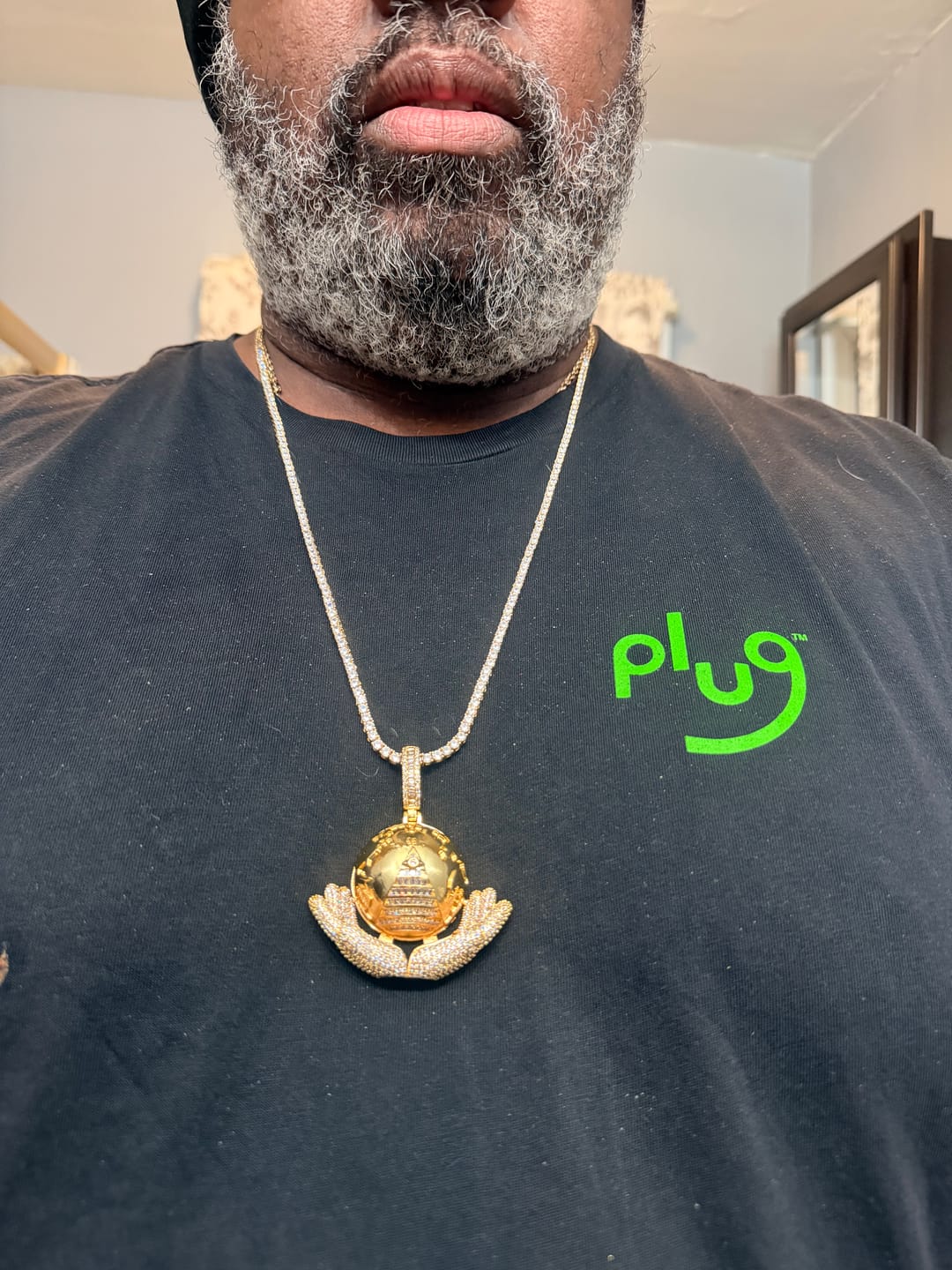 Customer photo review of The World Is Yours Pendant