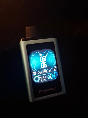 Customer's JNR Phonevape showing its glowing blue digital screen in a dark setting.