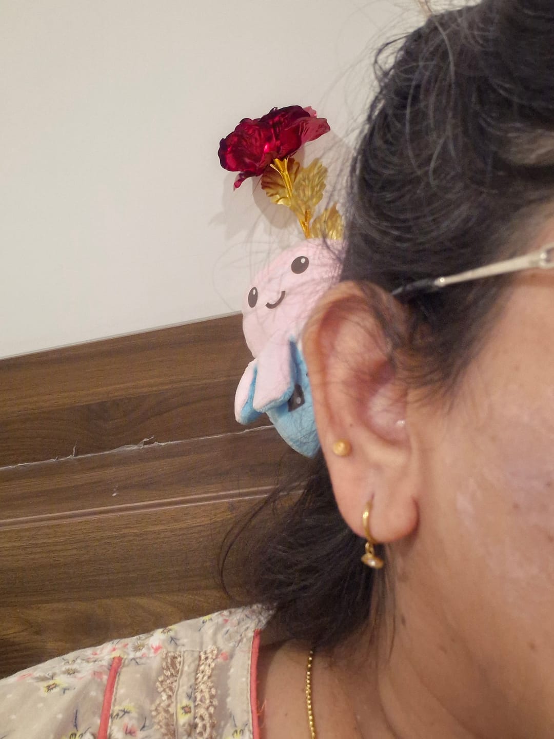 Customer photo review of Tiny Iris Star Hoop Earrings