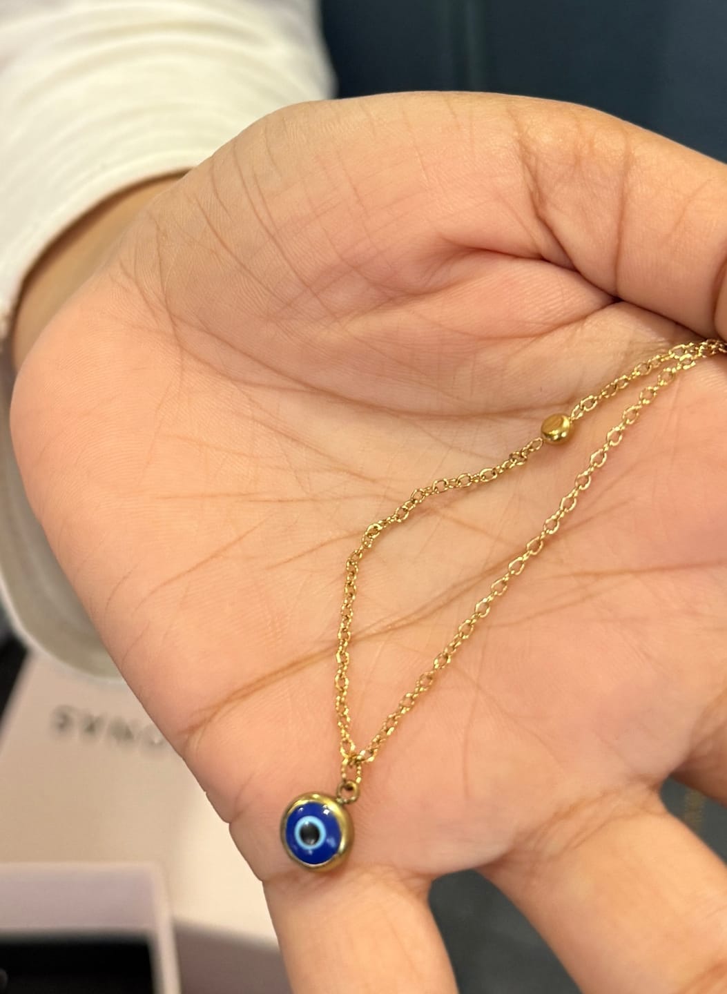 Customer photo review of Evil Eye Necklace
