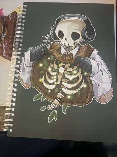 Customer photo review of Chilling Skeleton with Fireflies Large Reusable Sticker Book
