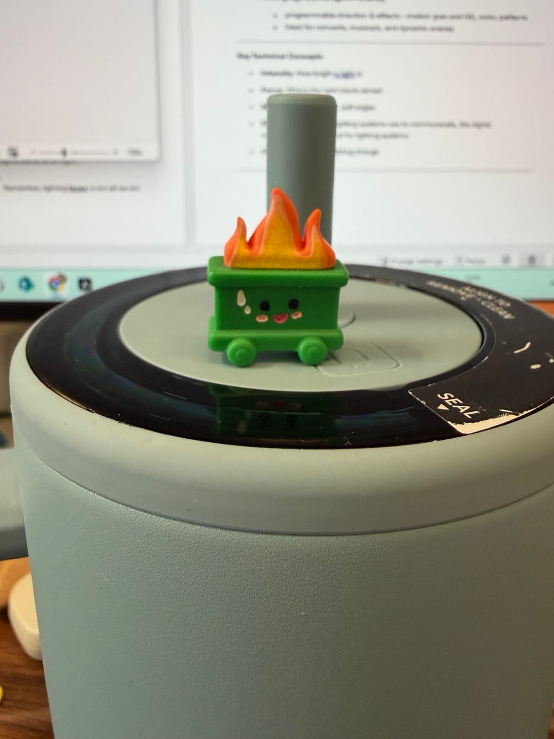 Customer photo review of Green Mini Emotional Support Dumpster Fire
