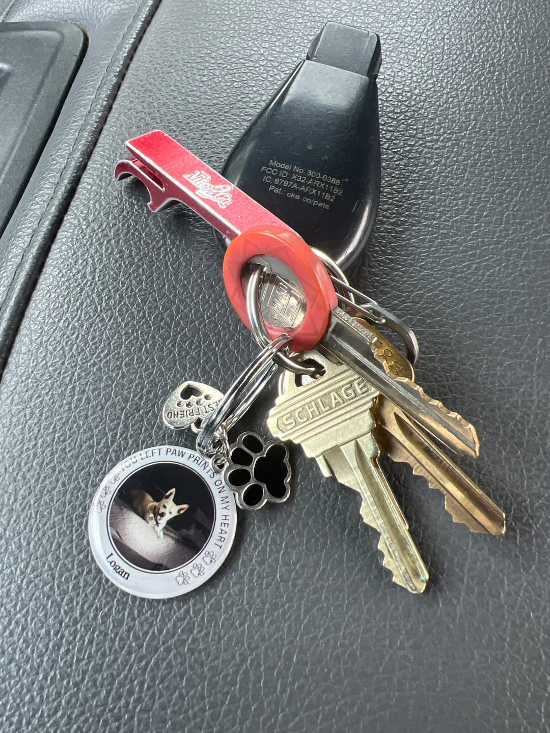 Customer photo review of Custom Personalized Photo Keychain Pet Charm Key Ornaments - Memorial Gift for Dog/Cat Lovers - You left paw prints on my heart