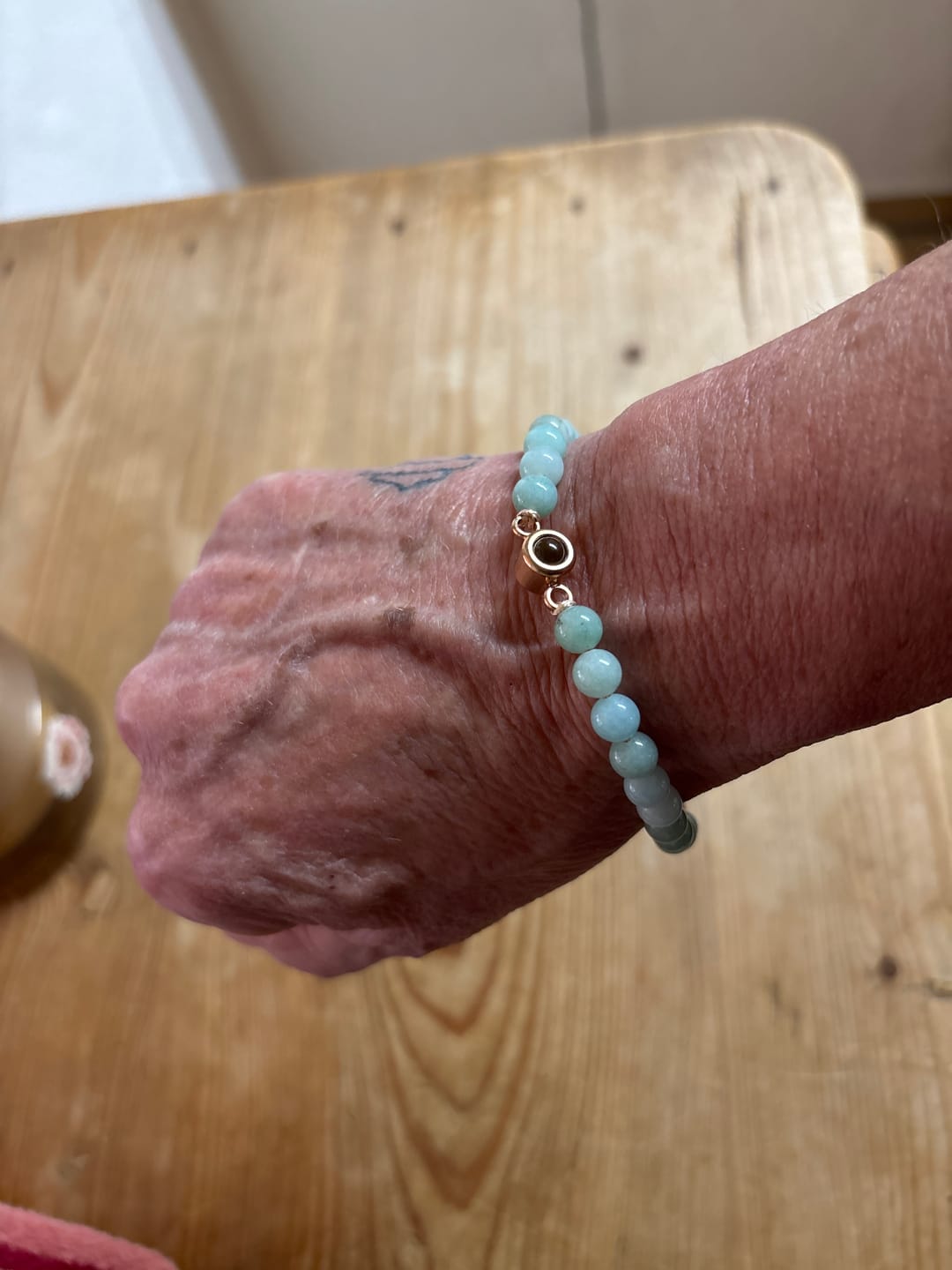 Customer photo review of Personalisiertes Perlen Armband mit Foto