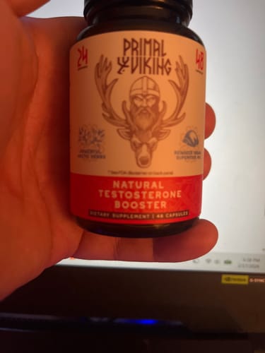Reviewer holding their bottle of Primal Reindeer Testosterone Support.