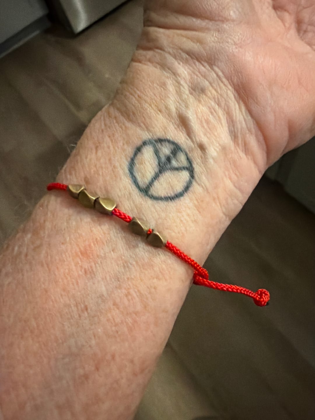 Customer photo review of Tibetan Red String Bracelet with Copper Beads – Handmade Unisex Protection & Good Luck Jewelry