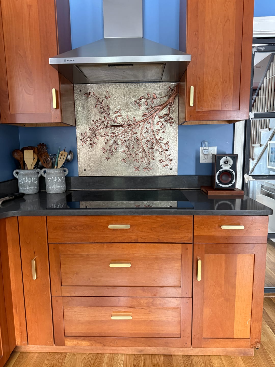 Customer photo review of Gray & Copper Tree Branches Backsplash