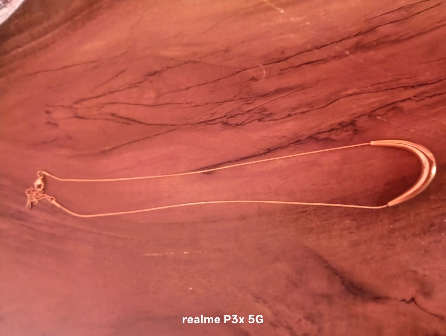 Customer photo review of Golden Boomerang Necklace