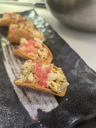 Customer's review for the Big Baller Cap, accompanied by a photo of food.
