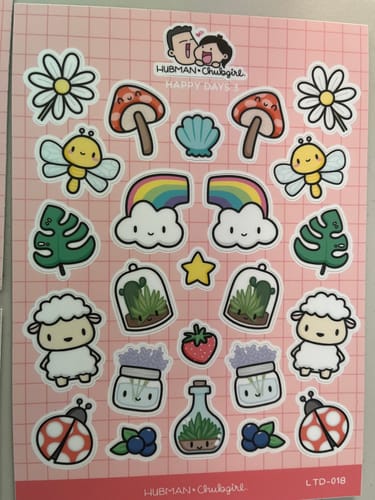Customer displays a STICKERS Promoproduct sheet featuring cute sheep, rainbows, mushrooms, and flowers.