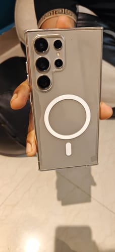 Customer holds a Samsung S24 Ultra with the Anti Yellow Magsafe Clear Case, showing the back view.