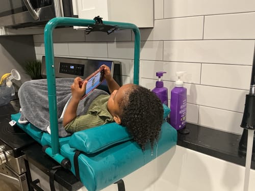 Customer photo review of Shampoo Mat® Neck Pillow