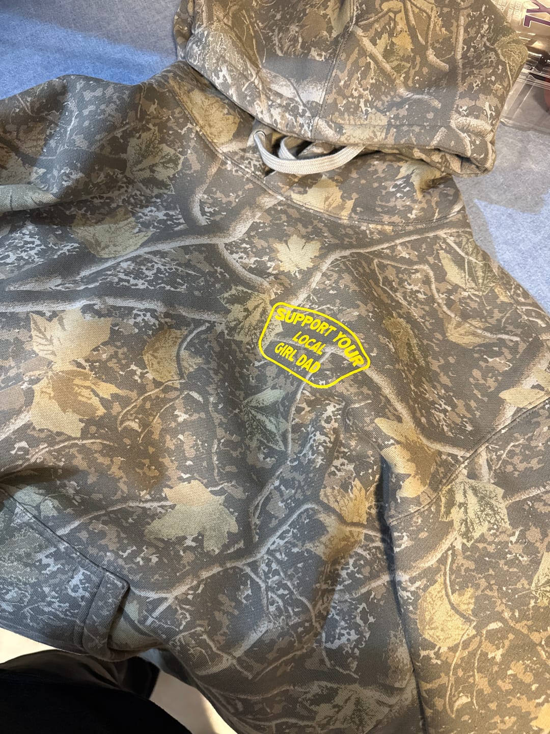 Customer photo review of Support Your Local Girl Dad Hoodie (Tree Camo Edition)