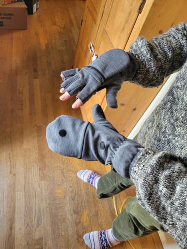 Customer wearing the Cameron Glove Mitten, one as a fingerless glove and the other as a full mitten.