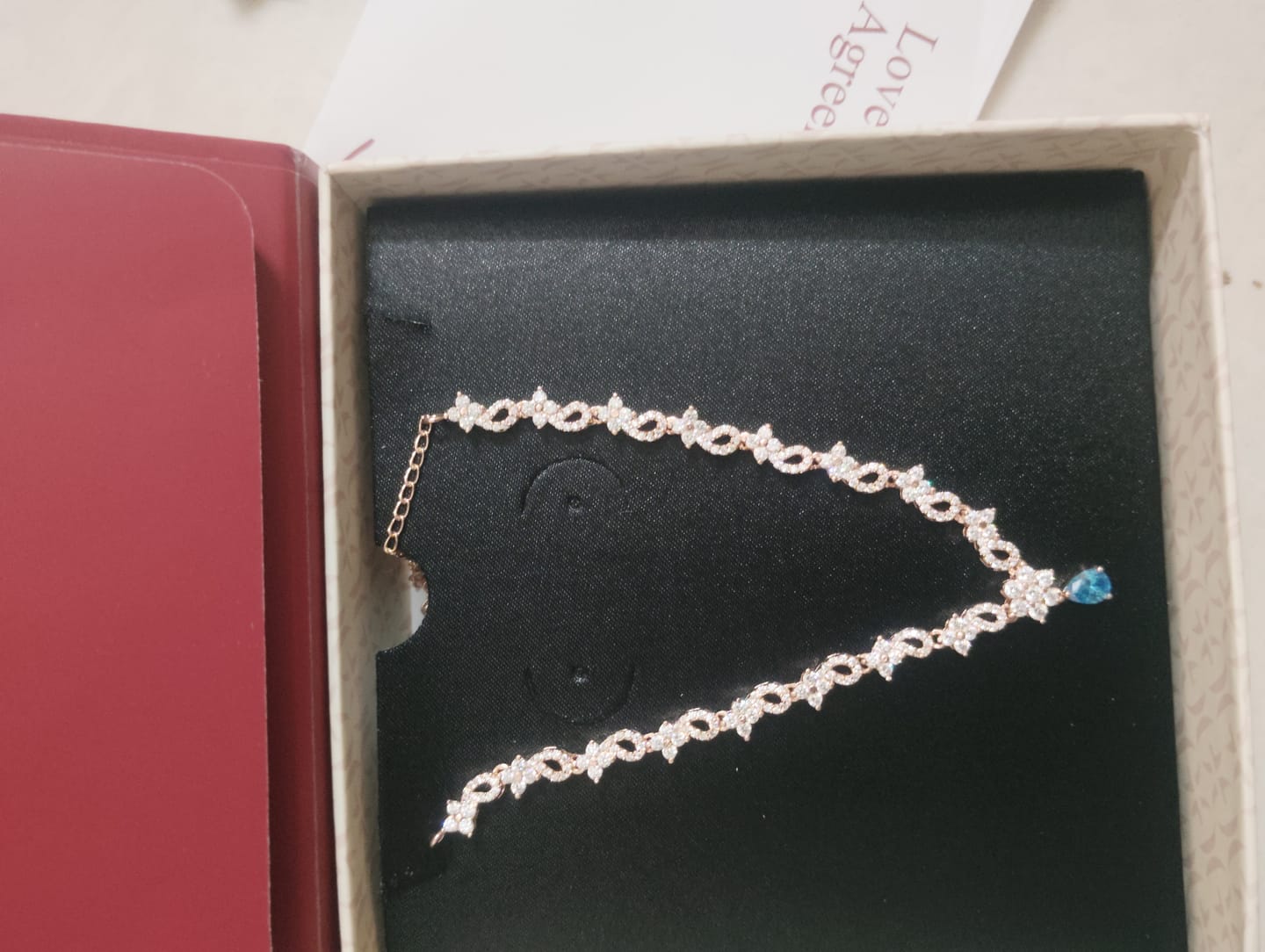 Customer photo review of Rose Gold Blue Moon Necklace