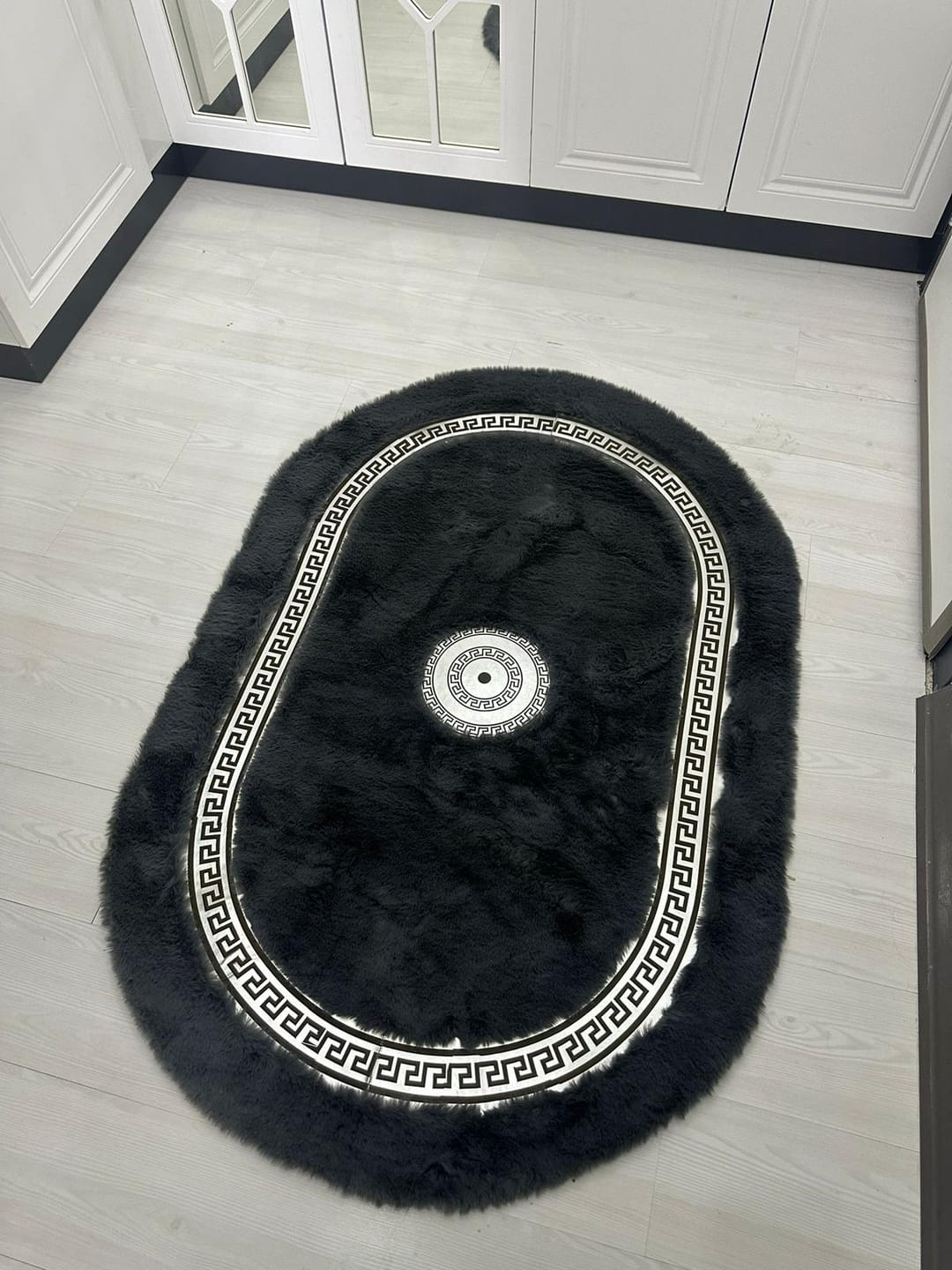 Customer photo review of Luxury Handmade Soft Black And Silver Faux Fur Bedroom Oval Fluffy Rug