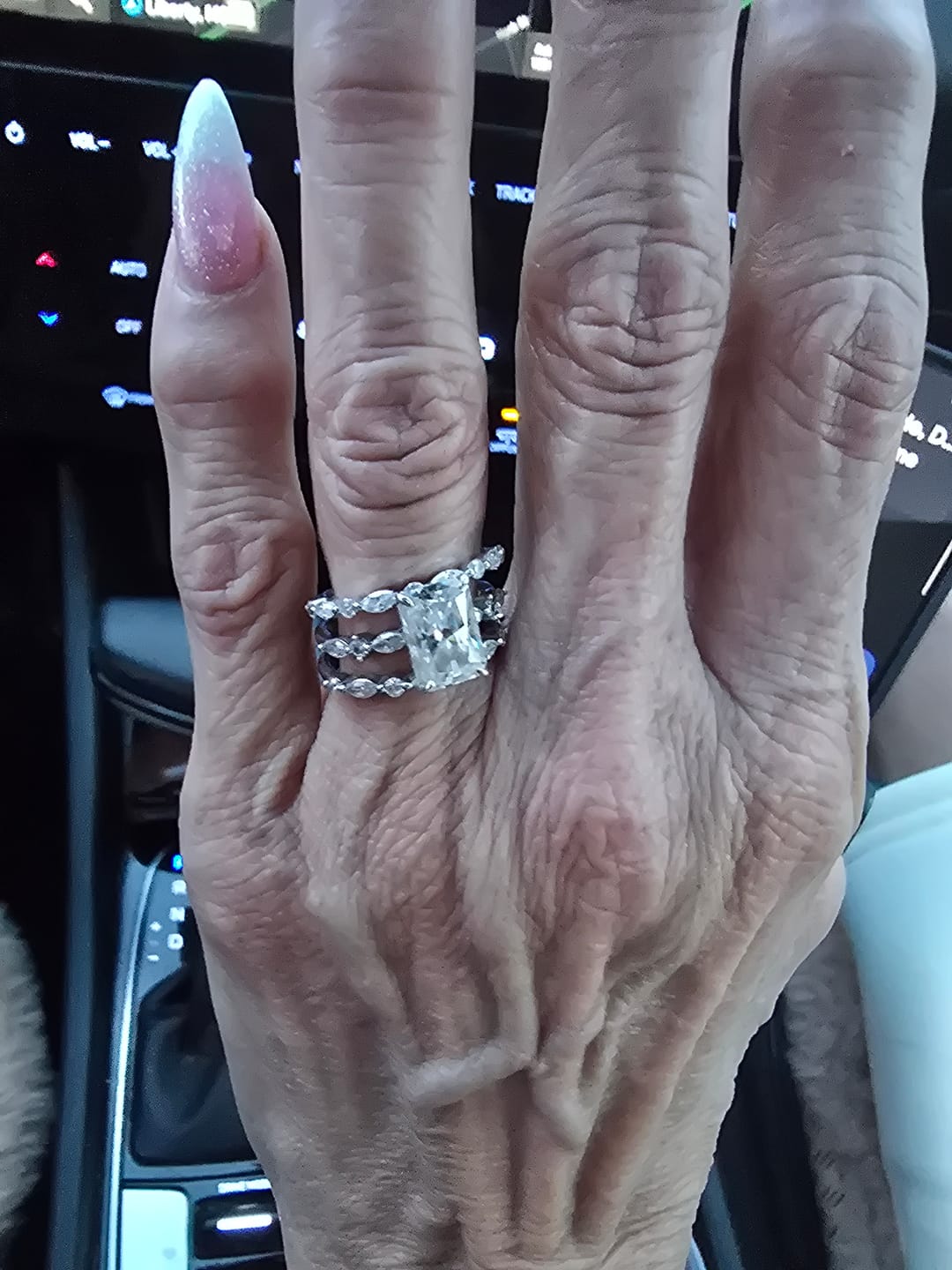 Customer photo review of S925 Moissanite 0.55Ct Marquise&Round Wedding Band In Sterling Silver