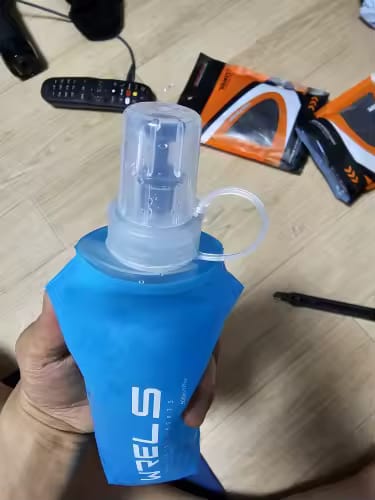 Recensione con foto di un cliente su HeroX RunBottle - Borraccia