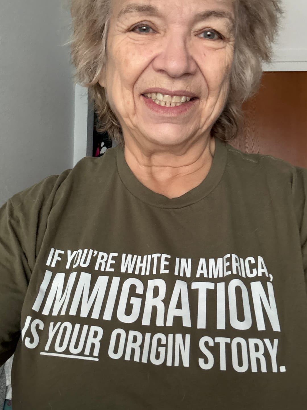 Customer photo review of If you're white in America, IMMIGRATION is your origin story Unisex Tee