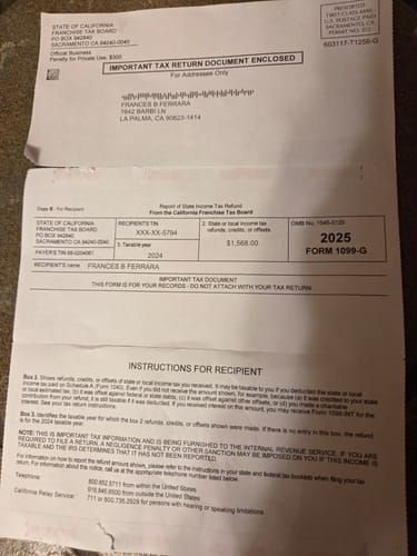 Customer's image showing several paper documents laid out on a surface, unrelated to the product.