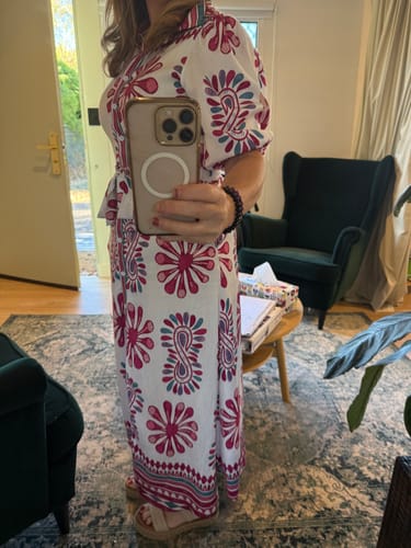 Reviewer's mirror selfie showing a side view of the printed Campbell Midi Shirt Dress with its puffed sleeves.