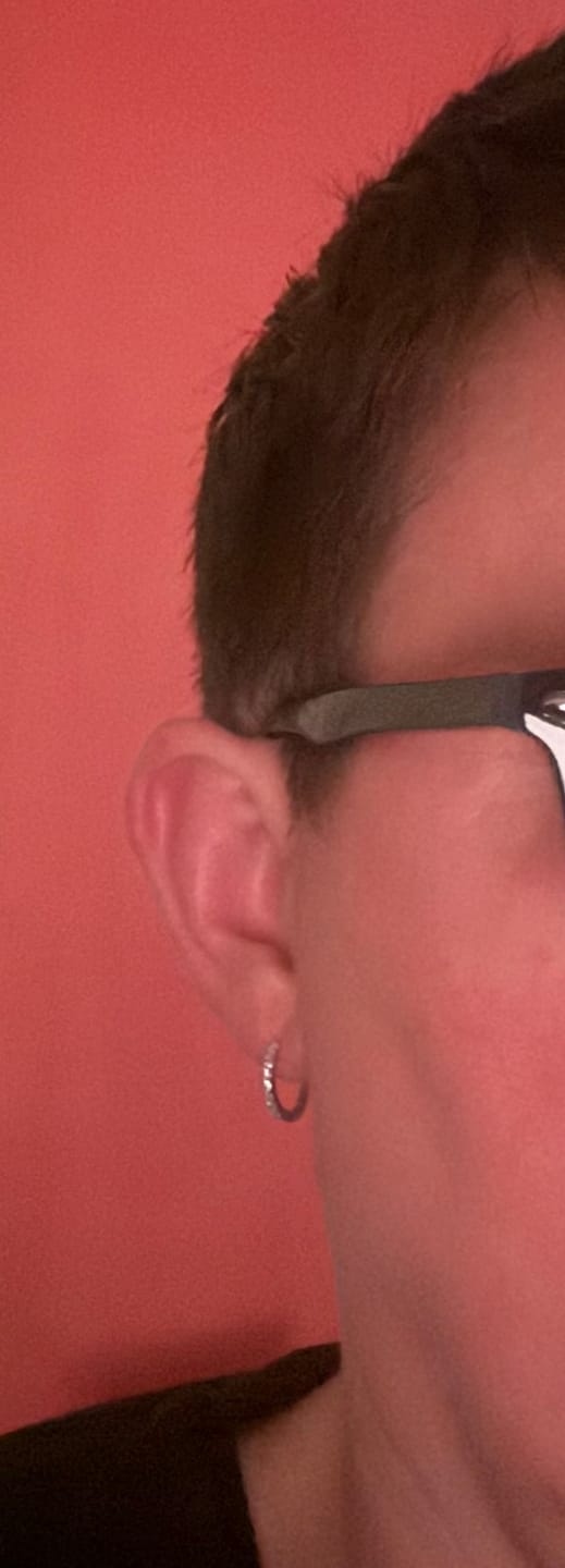 Customer photo review of Versa Single Spark Lab Grown Diamond Huggies Hoop Earrings