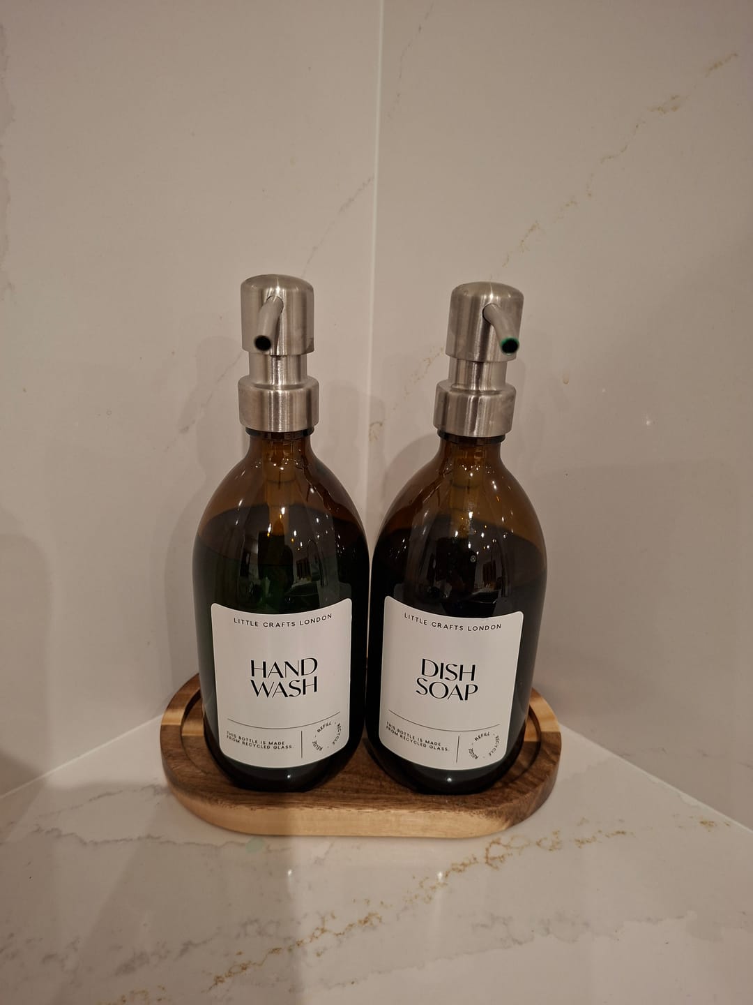 Customer photo review of 500ml Amber Glass Bottle with Metal Pump White Label