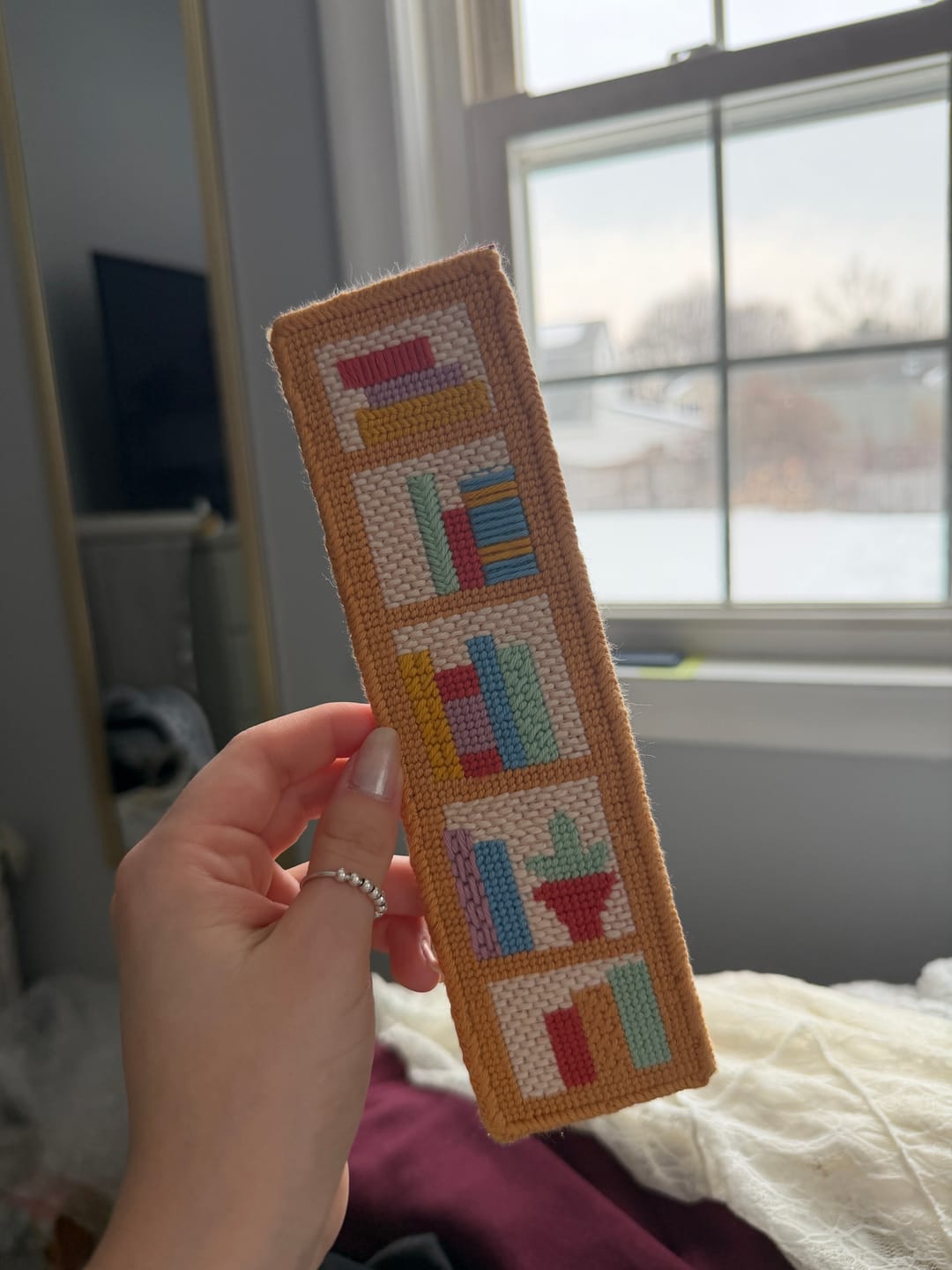 Customer photo review of Bookshelf Wealth Bookmark Needlepoint Kit