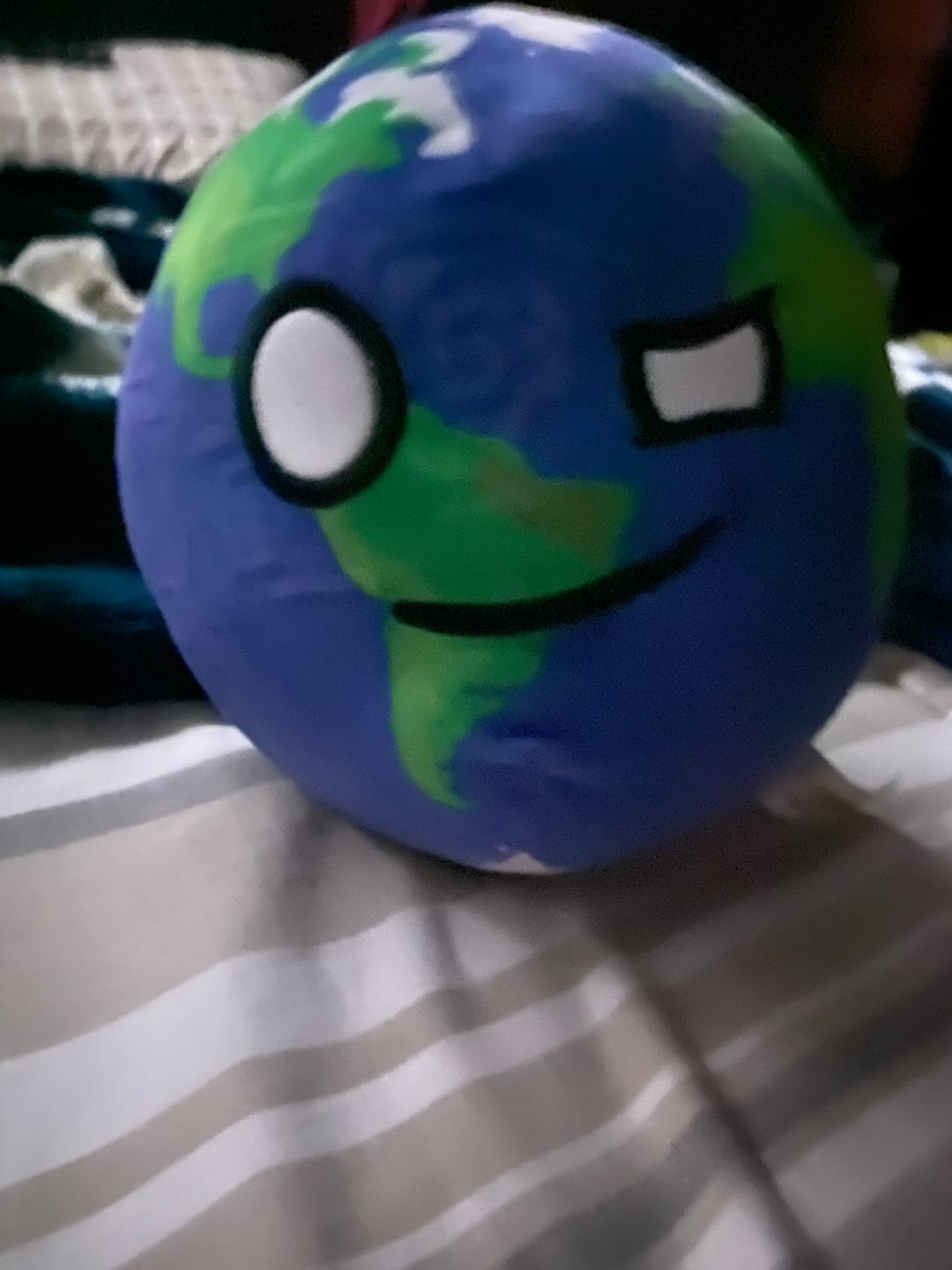 Customer photo review of The SolarBalls Earth Plush
