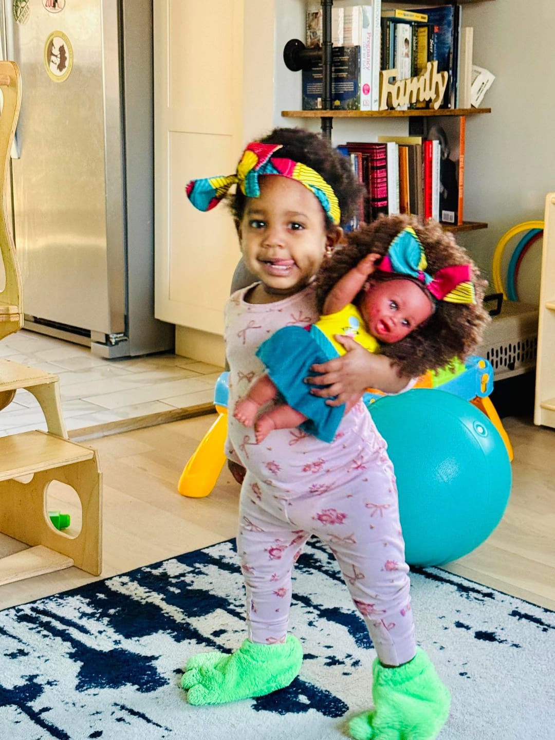 Customer photo review of Lovey Coiley Baby Bee Doll