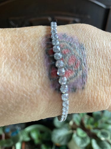 Customer wearing the lovely tennis bracelet from the clearance sale on their wrist.