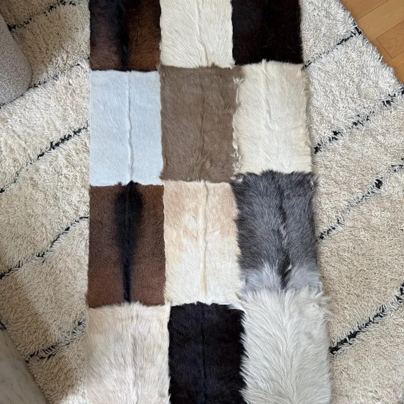 Customer photo review of Genuine Goatskin Patchwork Rug with Gold Trim – Handmade Luxury Hide