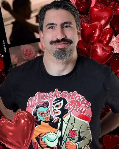 Customer wearing the black El Mexicano I Luchadore You T-Shirt with its vibrant graphic.