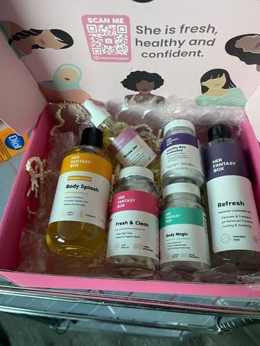 Customer's Ultimate Glow-Up Kit unboxed, showing all the supplement and skincare products inside the pink box.