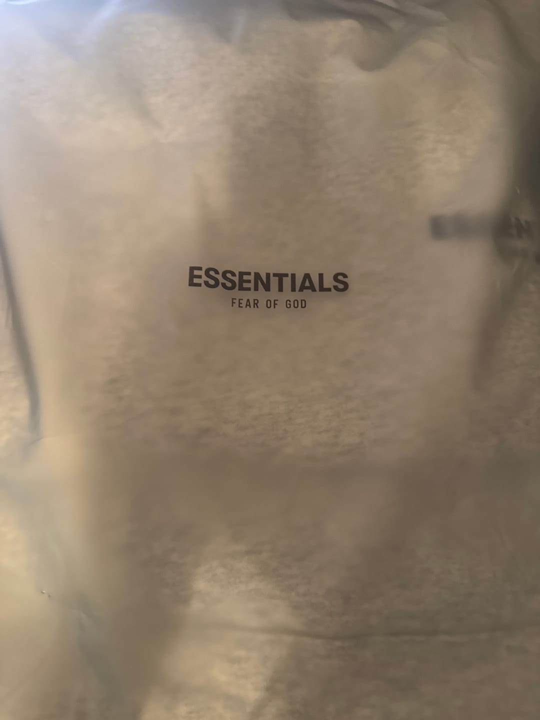 Customer photo review of Fear Of God Essentials Hoodie Light Oatmeal SS22