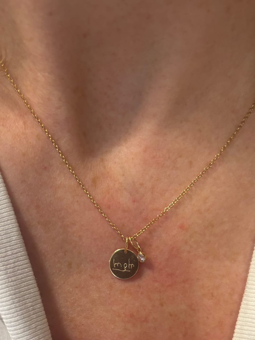 Customer photo review of Akela Small Disk Necklace