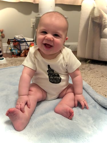 Customer photo review of graphic bodysuit | house white