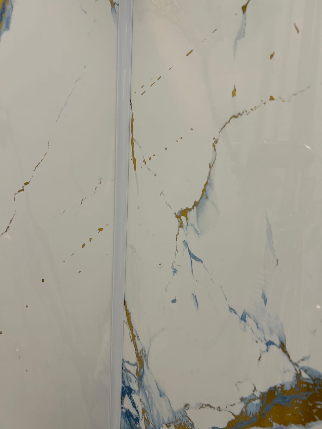Customer photo review of 10mm Oro Blue Gloss Shower Panel 1M x 2.4M