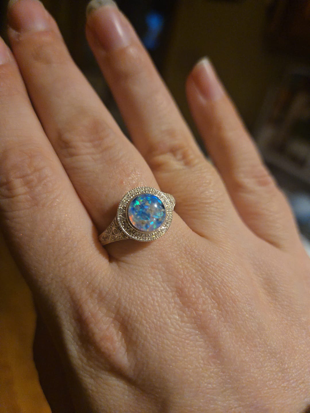 Customer photo review of Bedazzled Filigree Circle Opal Cremation Ring