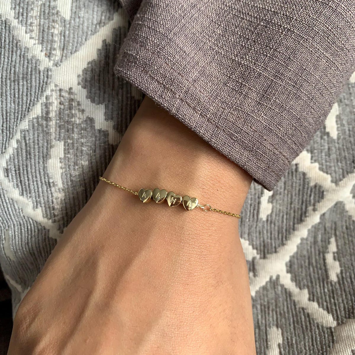Customer photo review of Pulseira em Coração com Inicial Personalizada