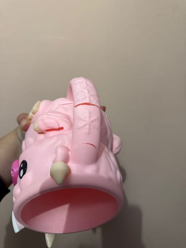 Customer photo review of Cowzy Holder 🐮