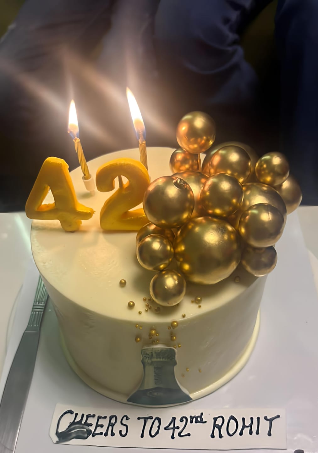 Customer photo review of Champagne Celebration Theme Cake