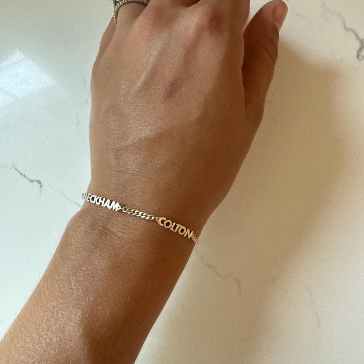 Customer photo review of Pulseira com Nome Personalizada
