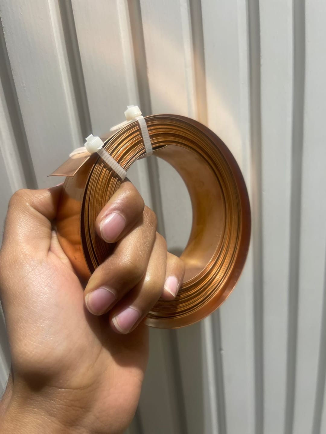Customer photo review of Premium 100% Pure Copper Vastu Remedy Strip 1 mm Thickness for Cut, Extension, Toilet and Door Corrections – High-Conductivity Metal Vastu Tool by Vastu Mandir