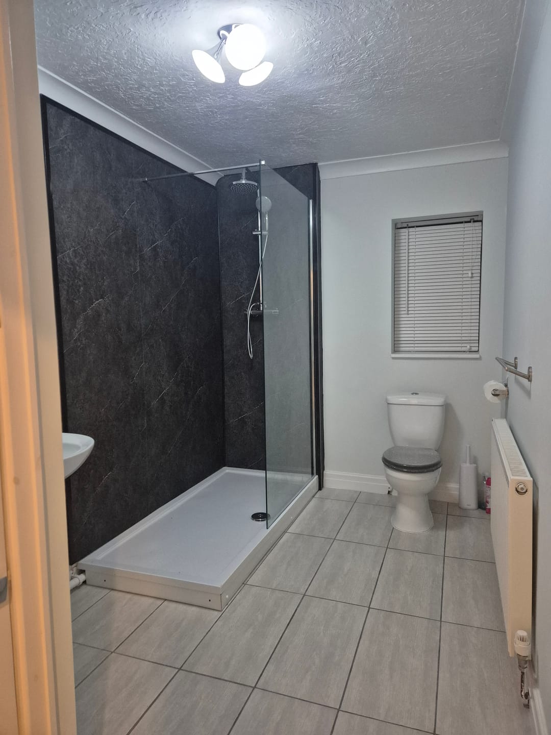 Customer photo review of 10mm Pietra Marble Ultra Matt Shower Panel 1M x 2.4M