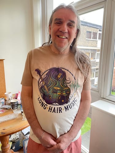Customer wearing the organic dip-dye t-shirt with a 'Long Hair Music' graphic.