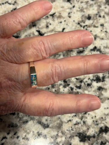 Customer wearing the Silver Bar Ring, showing the detailed blue and teal cremation ash inlay.