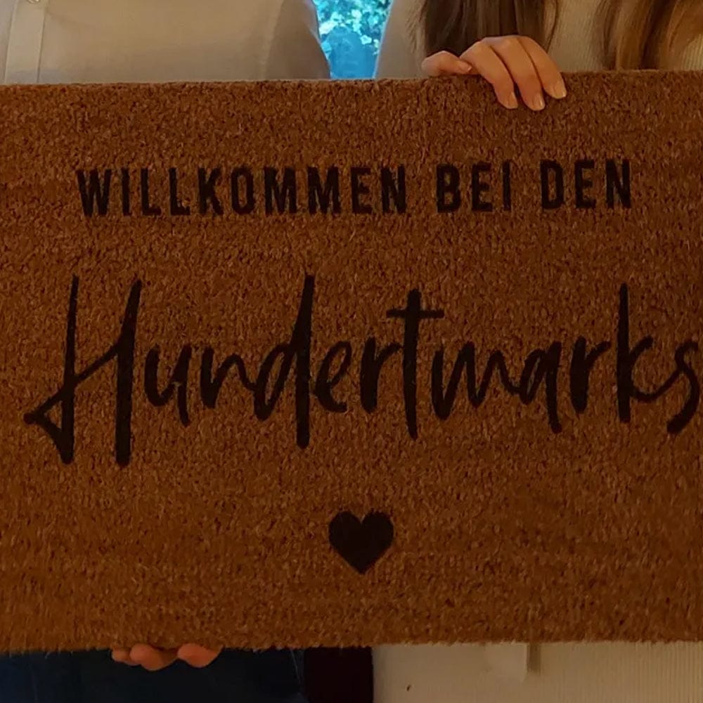 Customer photo review of Fußmatte aus Kokos personalisierbar – Familienname im Handlettering-Stil mit Herz
