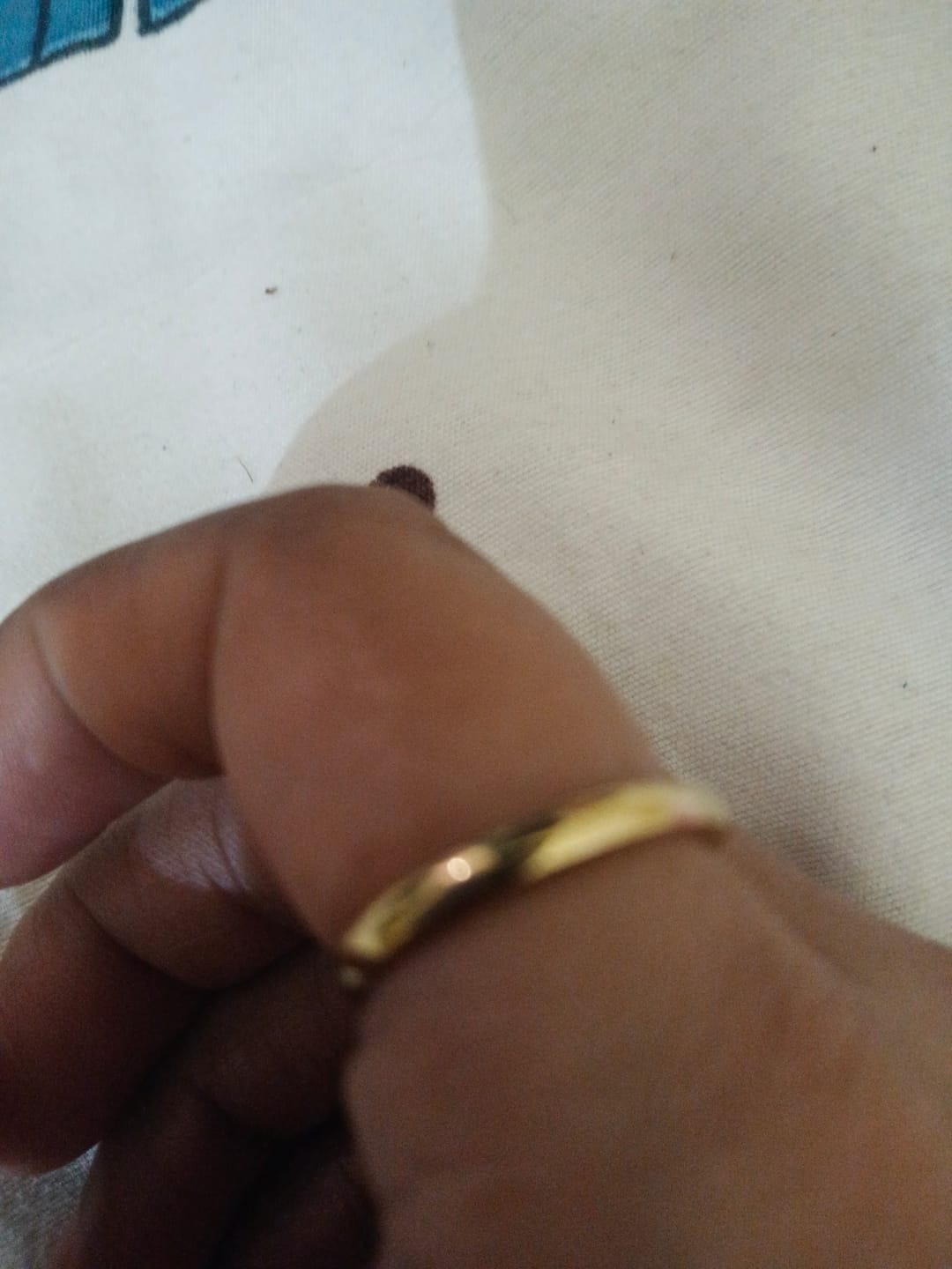 Customer photo review of Sole Aura Minimal Gold Band
