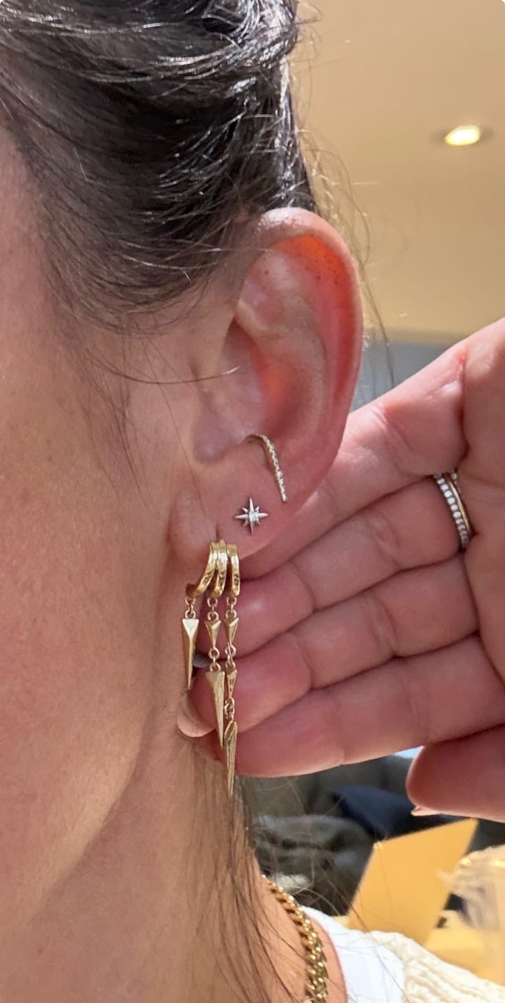 Customer photo review of Paloma Stacked Triple Hoop Huggie Illusion Earrings